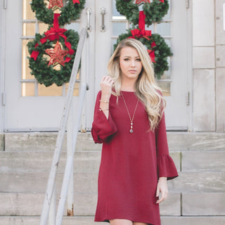 how to style a red wine dress for a christmas outfit