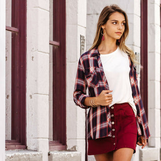 shop siloe features how to style an outfit from summer to fall with a plan top and red skirt for a fall outfit