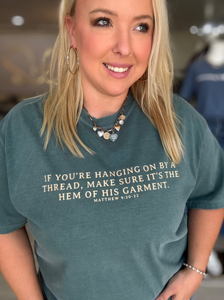 By The Hem of His Garment Graphic Tee
